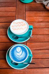 Latte art coffee and Matcha latte so delicious on white background