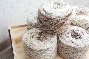 Yarn balls on a wooden box