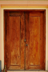 Fototapeta premium old wooden door in wall
