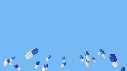 青いカプセル型の薬が沢山並んでいる画像