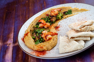 Hummus with shrimp, vegetables and homemade tortillas
