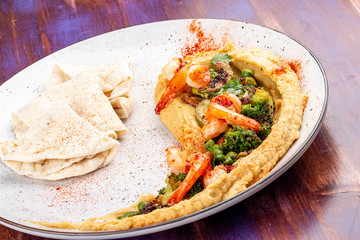 Hummus with shrimp, vegetables and homemade tortillas