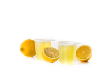 Lemon jellies on a plastic cup isolated on white background. Copy space	