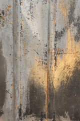 Detail of an old camouflage surface with exfoliated paint on military equipment. Military background