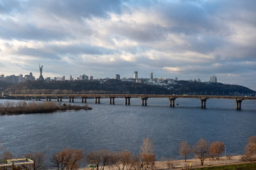 Fototapeta na wymiar View of the Dnieper River and Paton Bridge on the background of Kiev