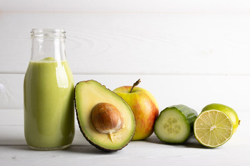 Detox smoothie with avocado, cucumber, apple and lemon.