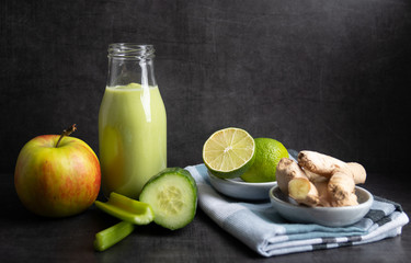 Detox smoothie with ginger, cucumber, apple and lemon.