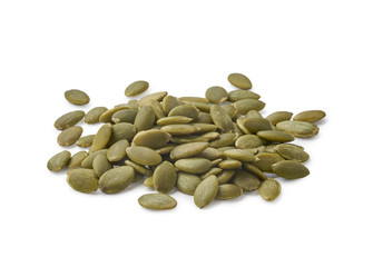 A pile of peeled pumpkin seeds isolated on white background