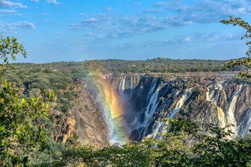 Crédence de cuisine en verre imprimé rainbow over landscape of Ruacana Falls on the Kunene River in Northern Namibia and Southern Angola border, Africa wilderness landscape