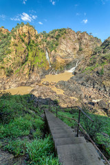 Fototapeta na wymiar stairs down to Ruacana Falls on the Kunene River in Northern Namibia and Southern Angola border, Africa wilderness landscape