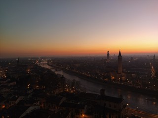 Fototapeta na wymiar Sunset on Verona town from Castel San Pietro in Italy
