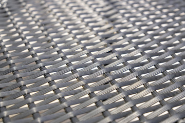 Fototapeta premium Black grey plastic lines basketry pattern texture background for table surface
