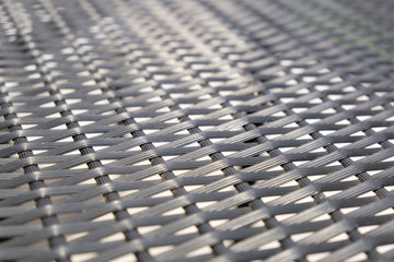 Naklejka premium Black grey plastic lines basketry pattern texture background for table surface