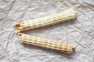 Wafer rolls on baking paper background. Traditional russian dessert