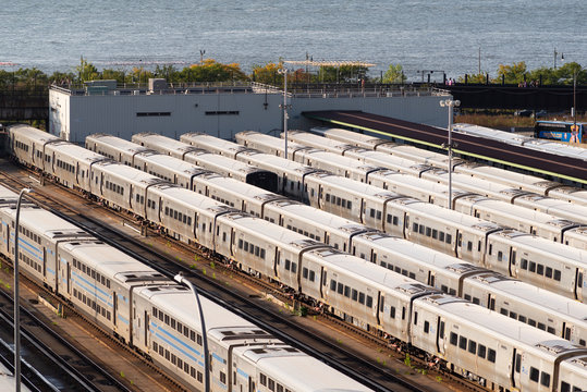 Commuter trains stored on the tracks of the West Side Yard as seen from top of The Vessel in Hudson Yards. Taken in New York City on October the 1st, 2019.