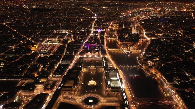 Museum le Louvre Paris by night aerial view la Seine river France