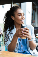 Attractive smiling young african businesswoman