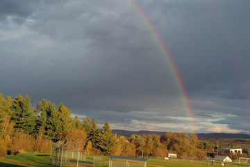 A rainbow over the village of Ensoburg Falls, Vt
