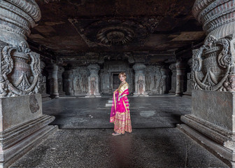 A Lady touring the Ellora Cave Ruins in India