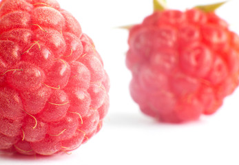 Juicy raspberry berry on a white background, isolate, macro