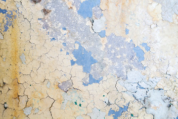 Obraz na płótnie Canvas OLd weathered wall with peeling paint