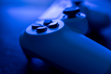Video game gaming controller night with lights dark background top view © Tom Eversley