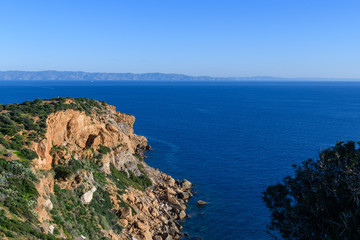 Fototapeta na wymiar Beautiful rocky coastline and blue sea