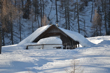 winter ski chalet and cabin in snow mountain