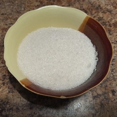 sugar in plate on kitchen table