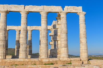 Obraz premium Ruins of ancient Temple of Poseidon at Cape Sounion in Attica, Greece