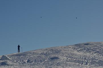 Snowshoe walker running in powder snow
