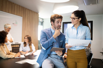 Successful group of business people at work in office