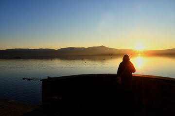 Naklejka na ściany i meble Sunset on the waters of Lake Viverone