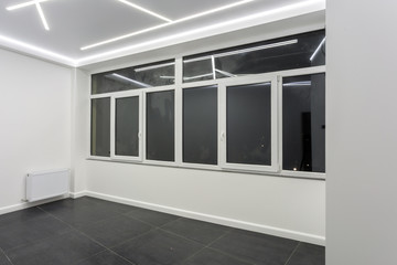 windows in empty unfurnished loft room interior white style color