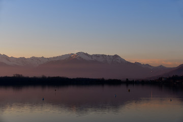 Obraz na płótnie Canvas Sunset on the waters of Lake Viverone
