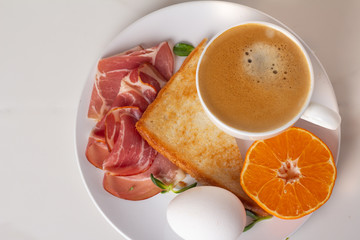 breakfast with fried eggs and bacon