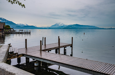 Landscape view of Lake Zug with wooden pier, Switzerland