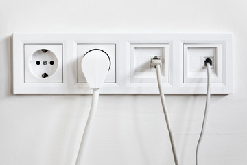 Telephone, internet and electrical socket outlet with conncetion cables