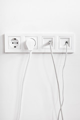 Telephone, internet and electrical socket outlet with conncetion cables