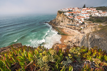 Sintra, Lisbon, Portugal. Azenhas do Mar white village landmark on the cliff and Atlantic ocean waves - obrazy, fototapety, plakaty