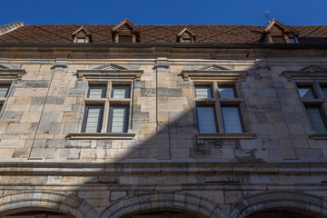 Traditional French architecture, Gothic style building wall with doors and windows