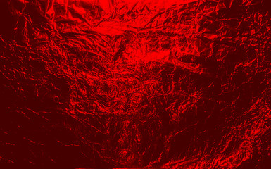 Red hellish  Halloween crumpled aluminum, titanium shiny foil background
