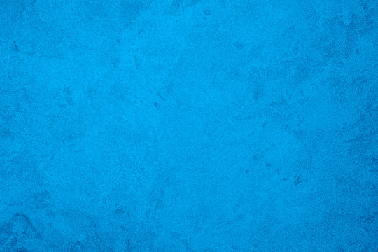 Texture of blue decorative plaster or concrete. Abstract background for design. Art stylized banner with copy space for text.