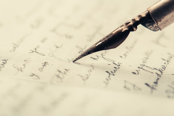 Fountain pen on an ancient handwritten letter. Old story. Retro style.