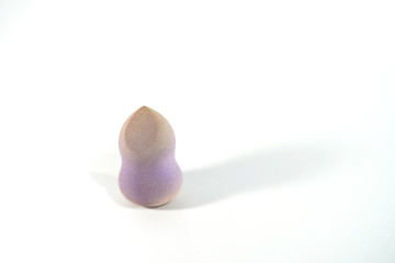 Dirty foundation sponge used isolation on white background.