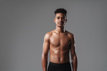 Fototapeta premium Photo of african american man looking at camera while working out