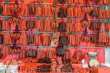 Chinese red sausages on display for sales at Smith St. near market at Chinatown area Lunar New year traditional food