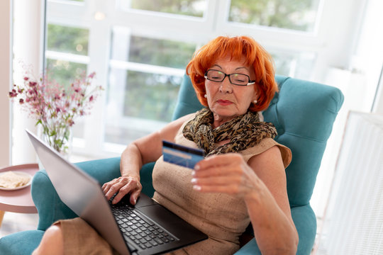 Elderly Woman Paying Online With Credit Card