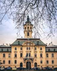Fototapeta na wymiar Facade of Szeged City Hall with branches