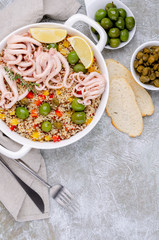 Quinoa with vegetables and squid tentacles